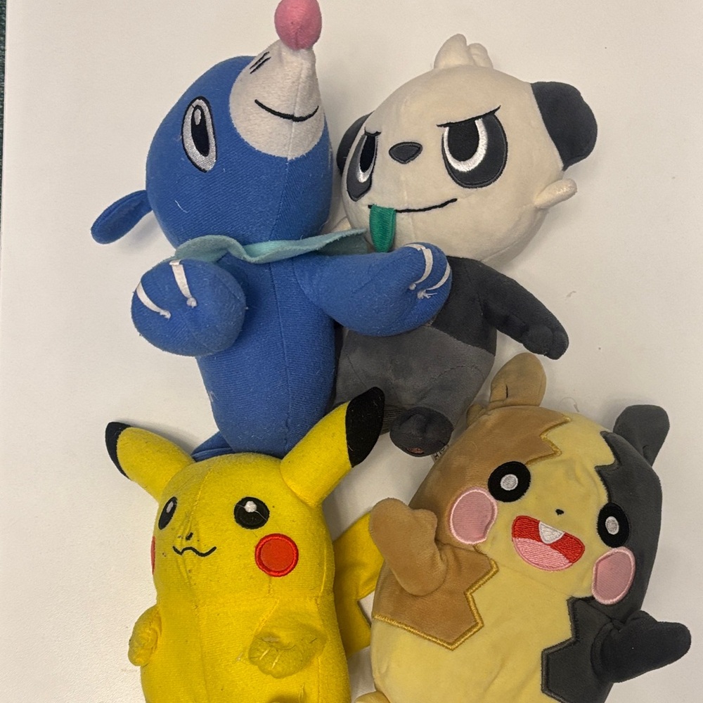 Pokemon Plush Set - Blue, Yellow, Black, and Cream